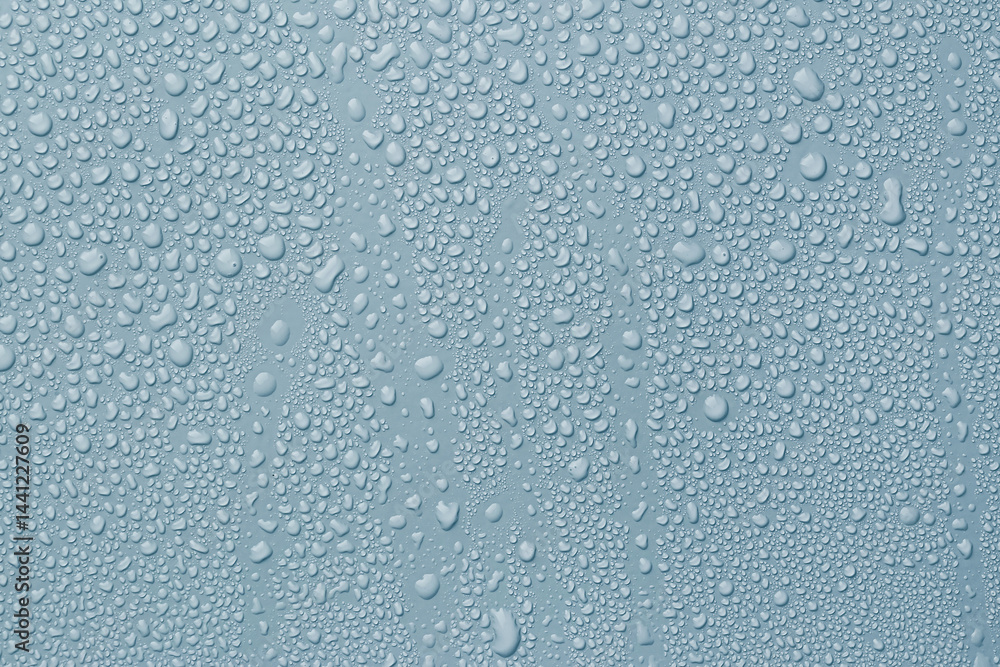 Many water drops on light blue background Many water drops on light blue background
