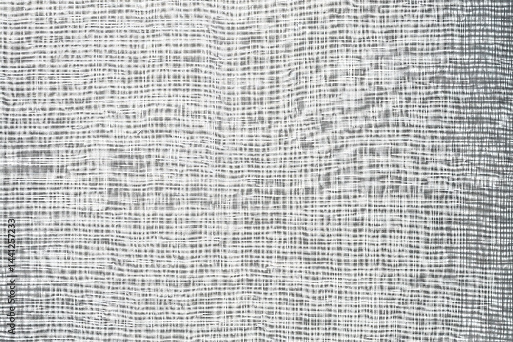 close-up of white textured fabric with intersecting horizontal and vertical threads creating a woven pattern close-up of white textured fabric with intersecting horizontal and vertical threads creating a woven pattern