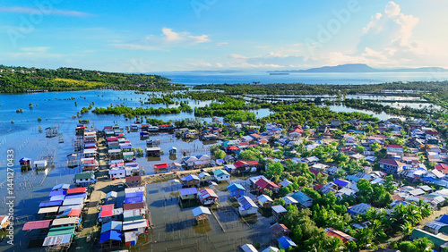 Aerial view over Surigao City looking towards Nonoc and Dinagat Islands across the Surigao Strait. 