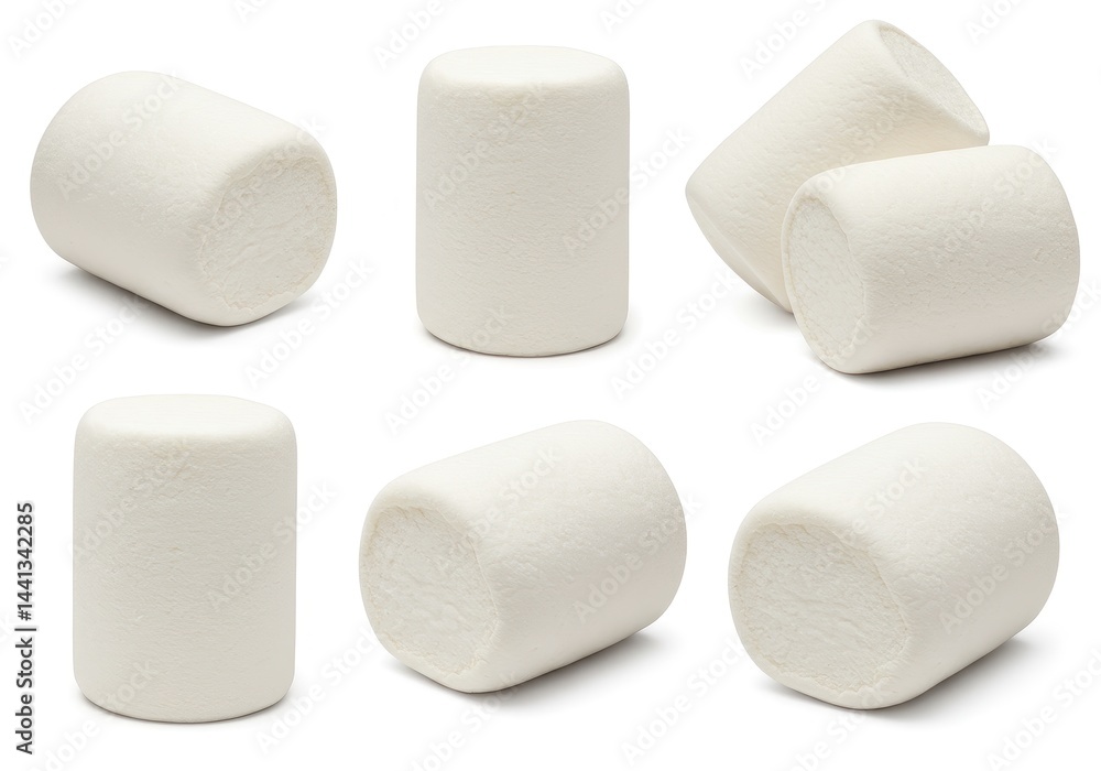 A close up studio shot showing several white marshmallows arranged on a plain white surface background A close up studio shot showing several white marshmallows arranged on a plain white surface background
