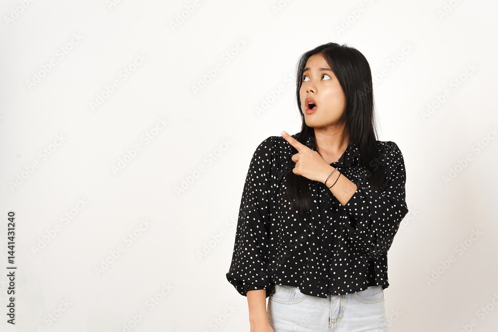 Presenting and Pointing Side Of Copy Space With Shocked Face Of Beautiful Asian Woman wearing black Isolated On White Background Presenting and Pointing Side Of Copy Space With Shocked Face Of Beautiful Asian Woman wearing black Isolated On White Background