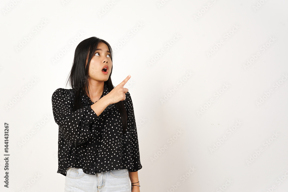 Presenting and Pointing Side Of Copy Space With Shocked Face Of Beautiful Asian Woman wearing black Isolated On White Background Presenting and Pointing Side Of Copy Space With Shocked Face Of Beautiful Asian Woman wearing black Isolated On White Background