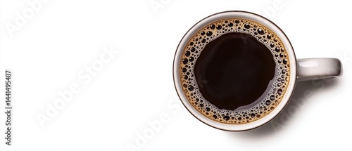 Obraz na płótnie Overhead shot of aromatic dark coffee with rich foam in a ceramic mug on a clean white background simple and elegant perfect for a morning pick me up w salonie