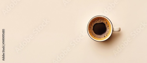Obraz na płótnie Minimalist Coffee Cup on Beige Background Top View Perfect for Morning Routine and Relaxing Moments Capturing the Essence of Simple Pleasures in a Clean and Modern Style w salonie