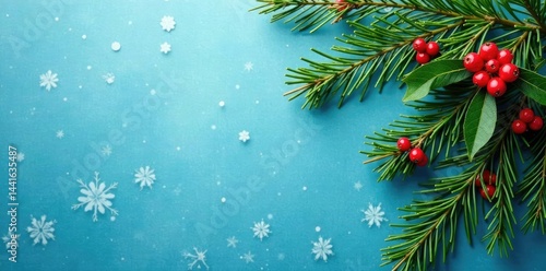 Evergreen holly branches with red berries on a frosty blue background, decoration, christmas