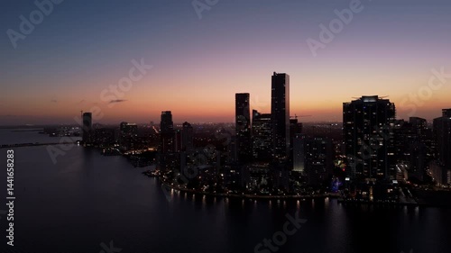 Wallpaper Mural Modern Skyscrapers on the coast of Miami in the dusk Illuminated by Sunset Light. Aerial wide view Torontodigital.ca