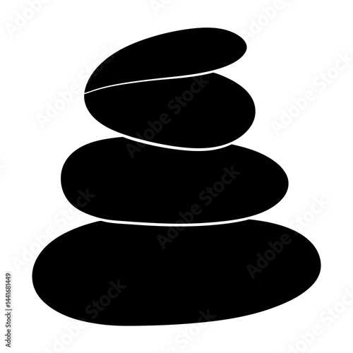 Smooth black pebbles stacked in zen stone silhouette