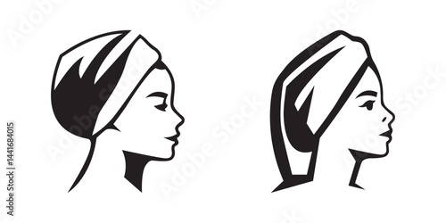 Silhouette of woman using hair towel after bath