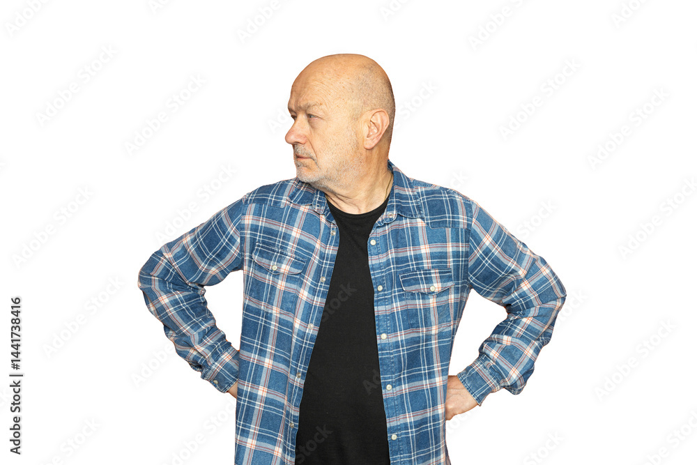 a man with his arms on his hips looking to the left