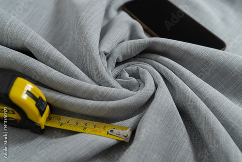 Swirled Twisted Fabric with measuring tape and phone