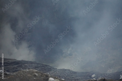 Volcanic eruption spectacle mountainous region nature photography ashy atmosphere close-up view geological activity