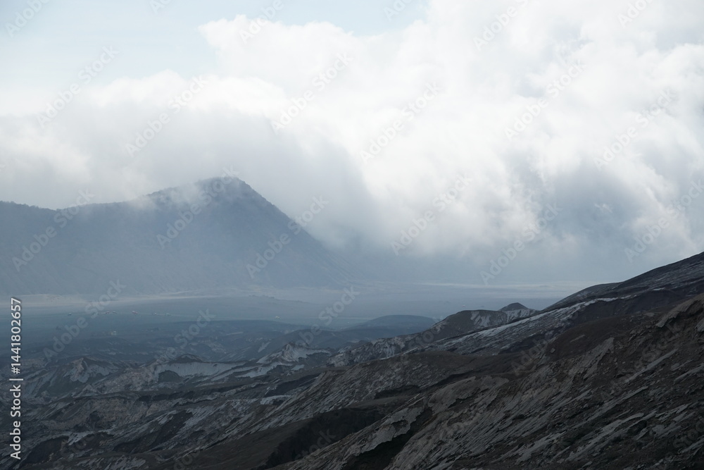 Dramatic mountain landscape with cloud cover nature scenic view atmospheric conditions Dramatic mountain landscape with cloud cover nature scenic view atmospheric conditions