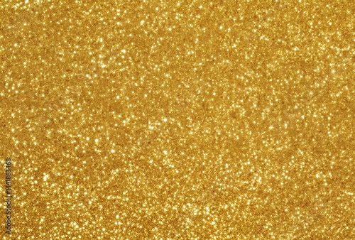 Flat gold glitter texture background with sparkling shine, minimalist and elegant design in golden color, perfect for luxury, festive, party, or celebratory themes and graphic design templates.
