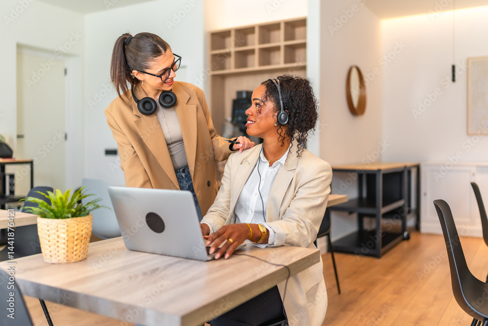 Coworkers supporting each other in modern office environment