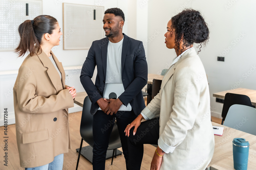Business people collaborating during informal meeting in office