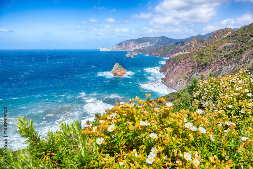 Attractive spring view of Nebida and Masua coast and Pan Di Zucchero on background.