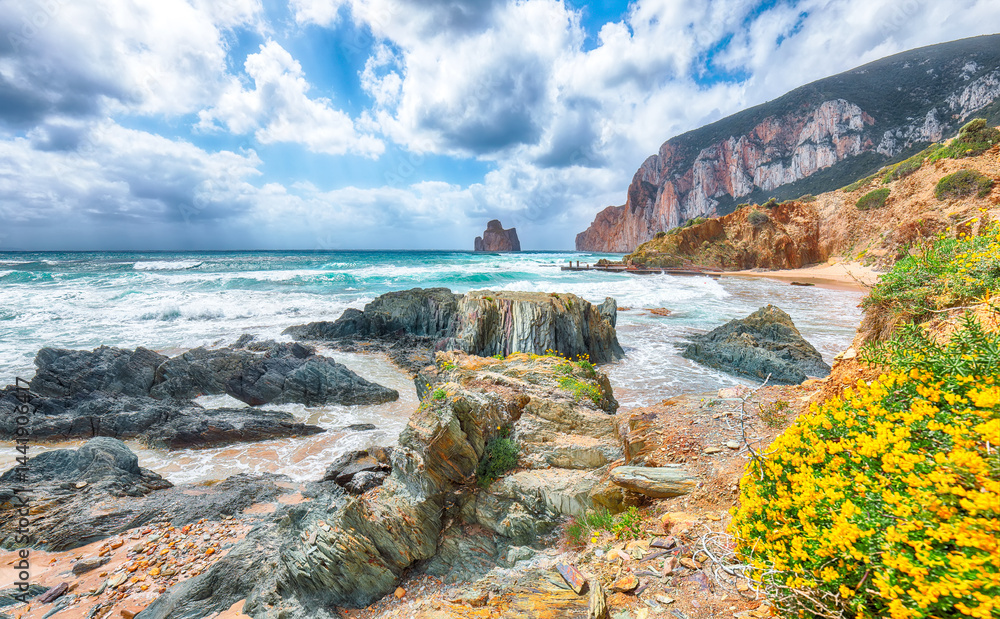 Attractive view of beach Portu Cauli in Masua with Pan di Zucchero at background.