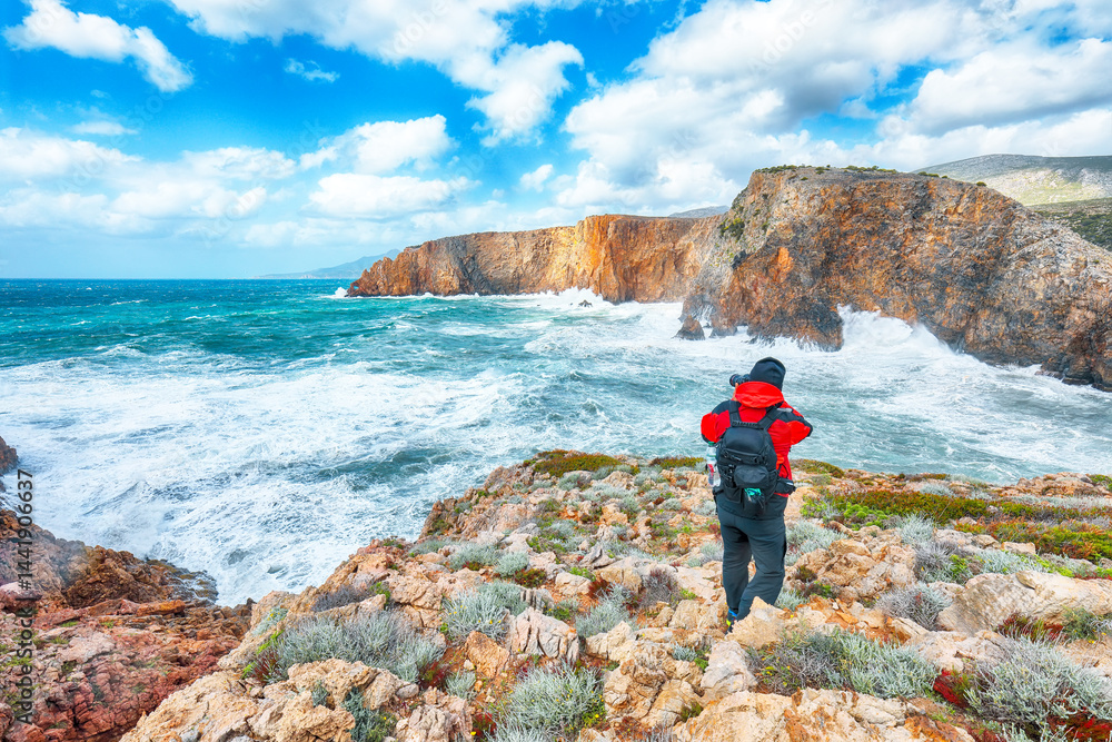 Unbelivable view of cliffs in valley Cala Domestica and storm on the sea
