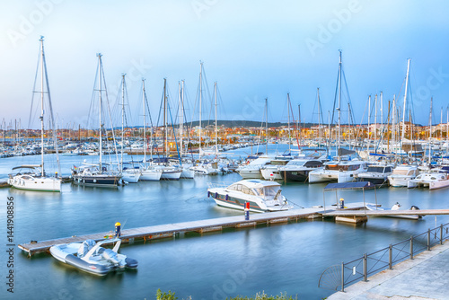 Obraz na płótnie Unbelivable evening view of Alghero port . Mediterranean seascape. w salonie