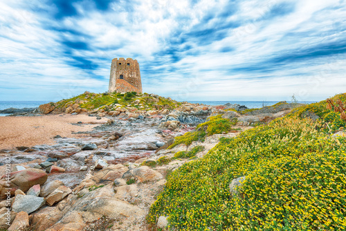 Exciting  sunset view of Bari Sardo tower in the Gulf of Orosei.