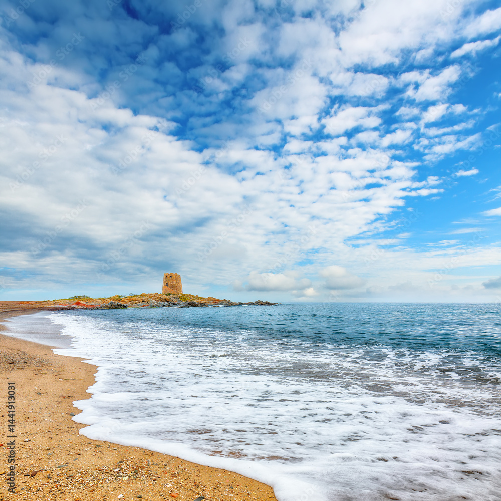 Impressive view of Bari Sardo tower in the Gulf of Orosei.