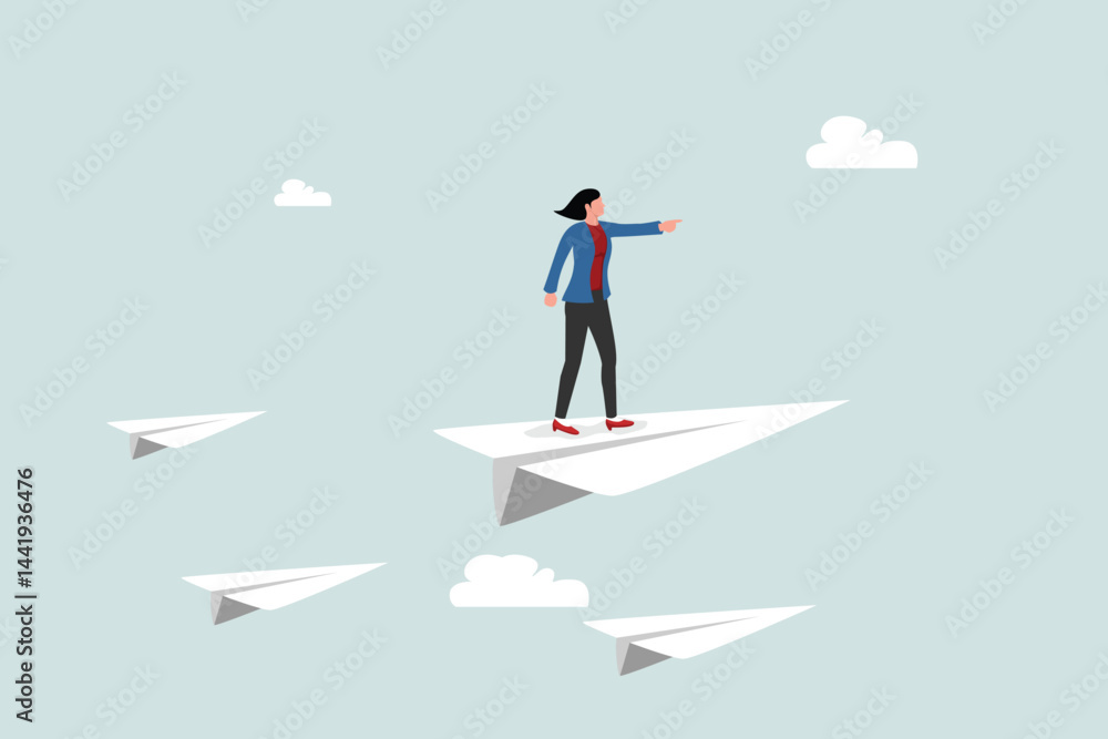 Obraz premium Business leadership, woman power to lead company to achieve target, smart confidence businesswoman standing on leading flying paper airplane origami pointing finger to the direction to reach goal