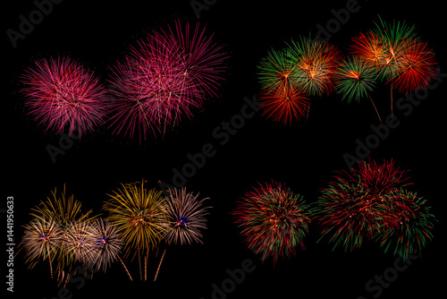 Set of colorful fireworks on the black sky.