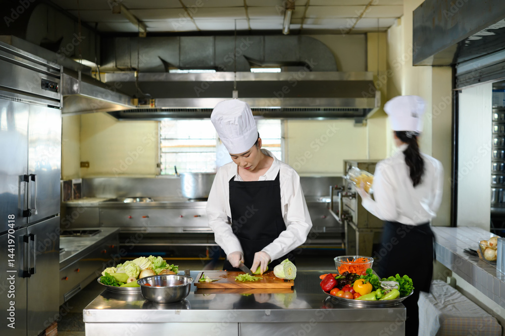 Culinary student practicing vegetable cutting skills in a professional kitchen Culinary student practicing vegetable cutting skills in a professional kitchen