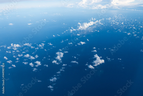 Aerial cloudscaspe picturesque clouds and sky from top view over the horizon