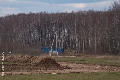 construction equipment on the section of the highway, laying of an underground gas pipeline