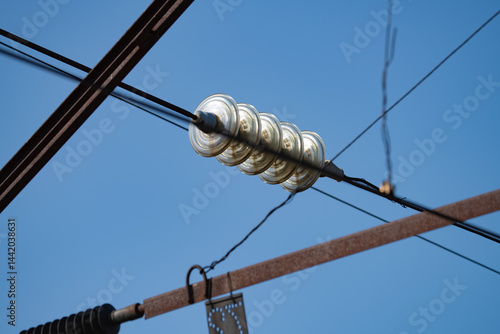 Obraz na płótnie wires on a high-voltage power line next to the railway, spring day w salonie