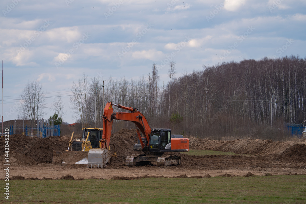 construction equipment on the section of the highway, laying of an underground gas pipeline