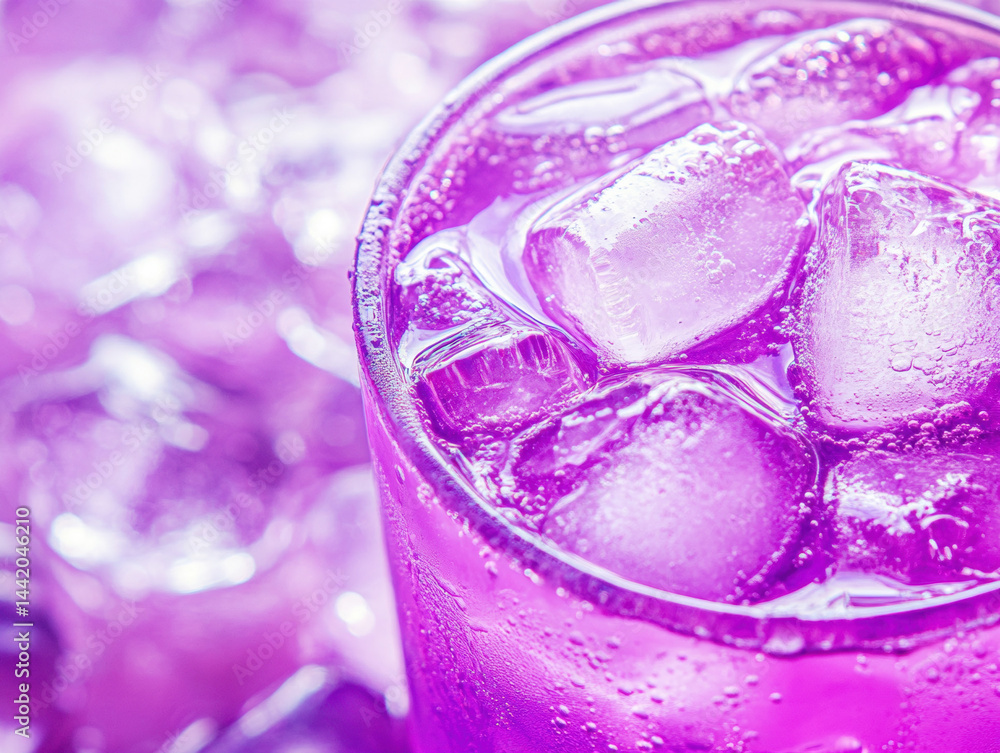 Refreshing purple drink with ice in a vibrant setting Refreshing purple drink with ice in a vibrant setting