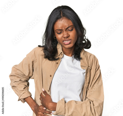 Portrait of a young Indian woman having a liver pain, stomach ache.