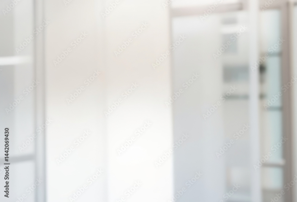 Abstract blurred background with white surfaces and soft light creating a minimalist aesthetic. Abstract blurred background with white surfaces and soft light creating a minimalist aesthetic.