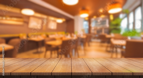 Wallpaper Mural Empty wooden table top with lights bokeh on blur restaurant background. Torontodigital.ca