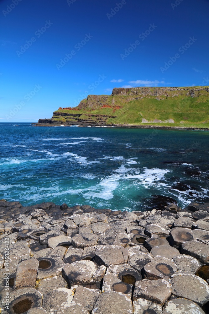Giant's Causeway natural landmark in Northern Ireland. Wonder of nature in County Antrim. Summer landscape.