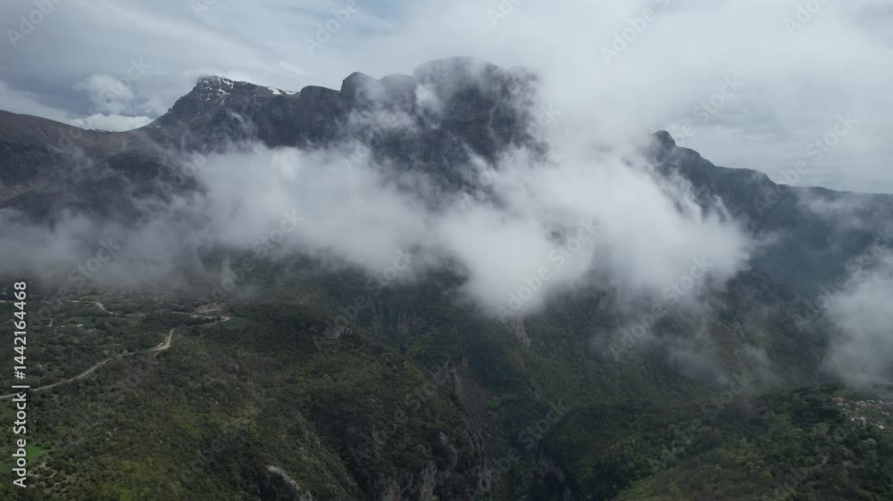 Panoramic view of Tymfi Mountain and Vikos gorge. Zagoria area, Epirus region, Greece Panoramic view of Tymfi Mountain and Vikos gorge. Zagoria area, Epirus region, Greece