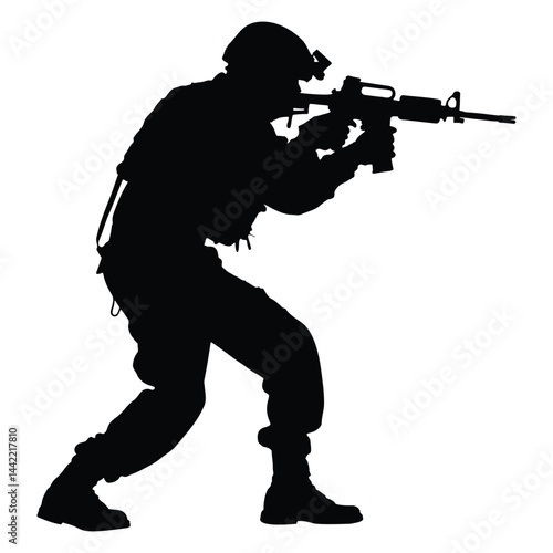  Silhouette of armed soldier aiming rifle in tactical pose
