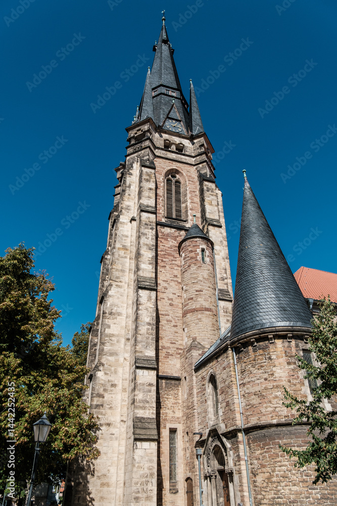 Stunning Gothic Church Spire Majestically Rising Under a Beautiful, Clear Blue Sky. Germany.
