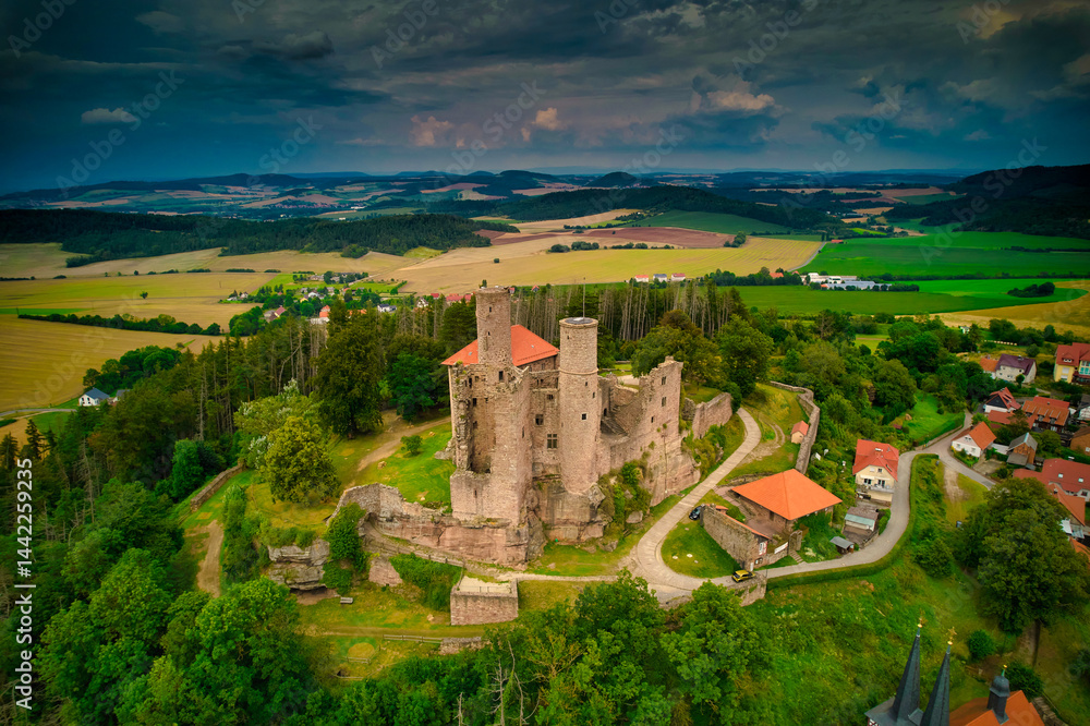 Stunning Aerial View of a Magnificent Ancient Castle Enveloped by Verdant Lush Landscapes. Hanstein castle, Germany.