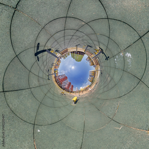 Obraz na płótnie blue hole sphere or globe little planet inside grass or sand or dry ground frame background with tractor tracks w salonie