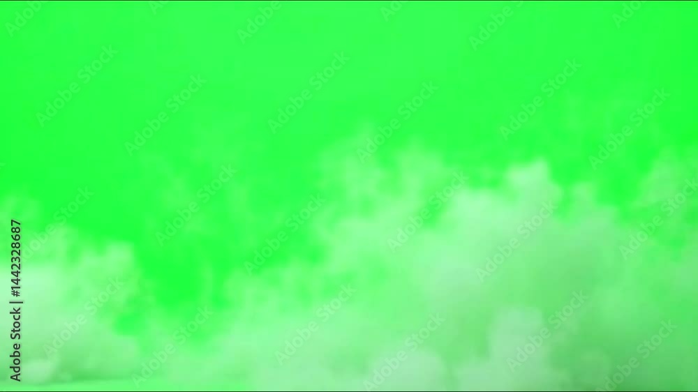 Thick fog or smoke drifts smoothly across a green screen background, ideal for seamless video compositing and atmospheric visual effects.