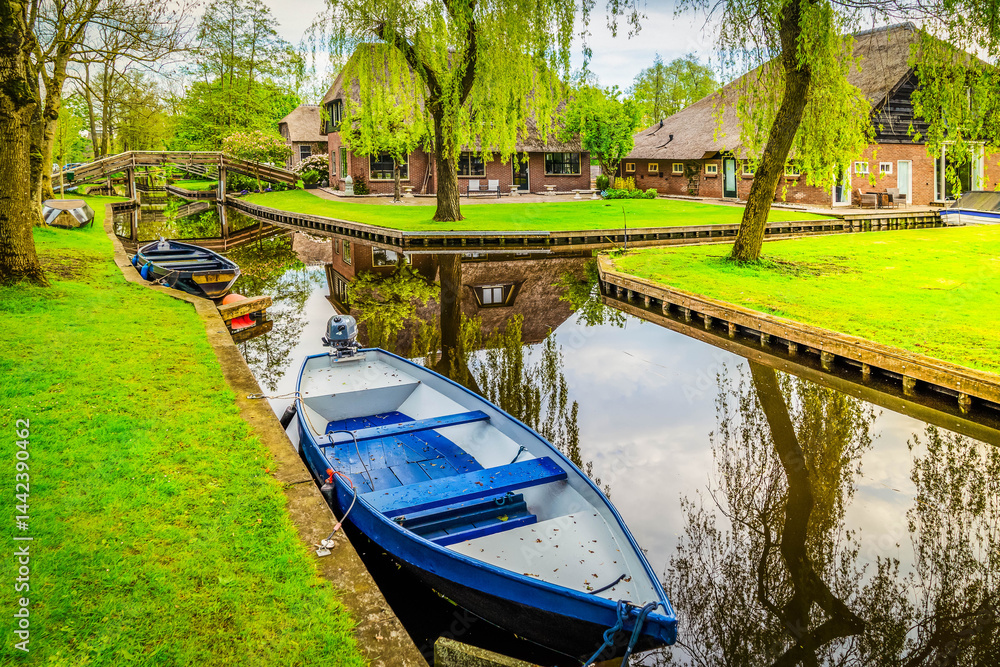 rural dutch traditional country small old town Giethoorn with canals and boats, Netherlands rural dutch traditional country small old town Giethoorn with canals and boats, Netherlands