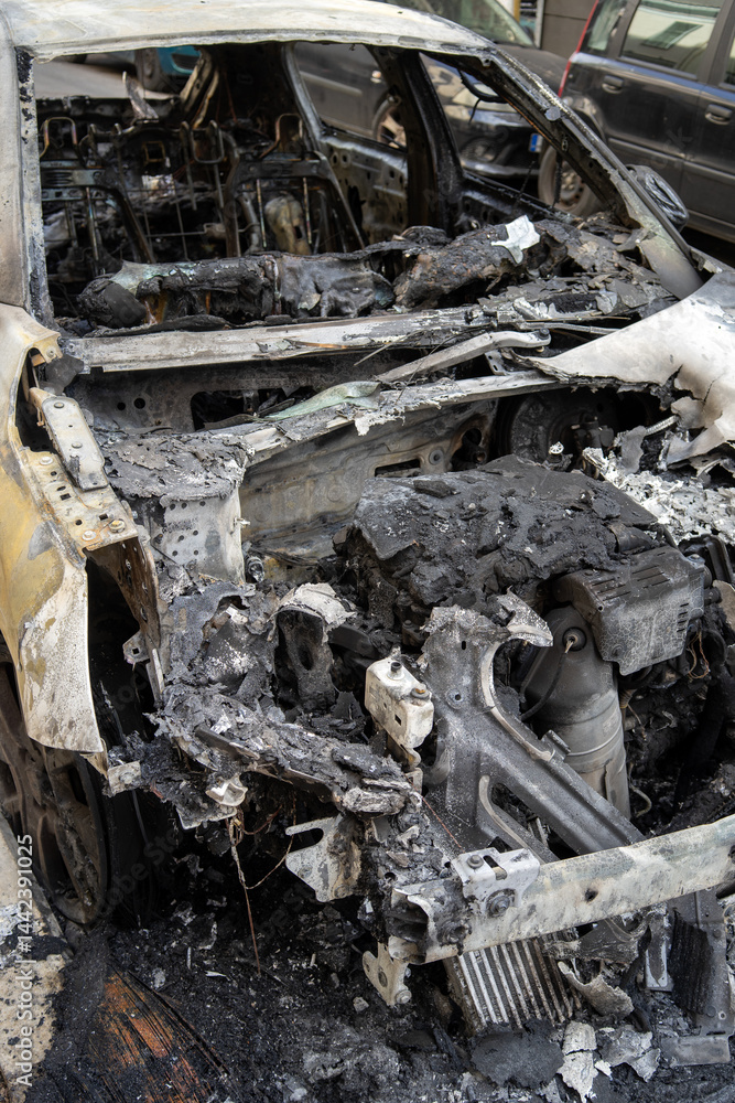 Burnt car in Eksarchia district after clashes between anarchists and the police.