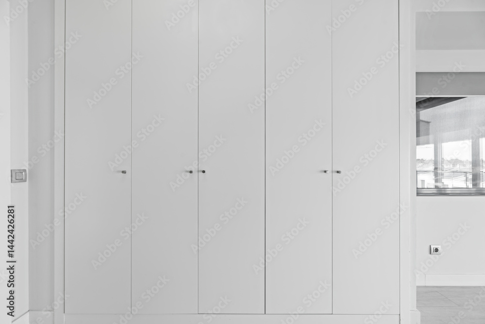 a closet with an interior layout that optimizes space and makes each type of item easy to access a closet with an interior layout that optimizes space and makes each type of item easy to access