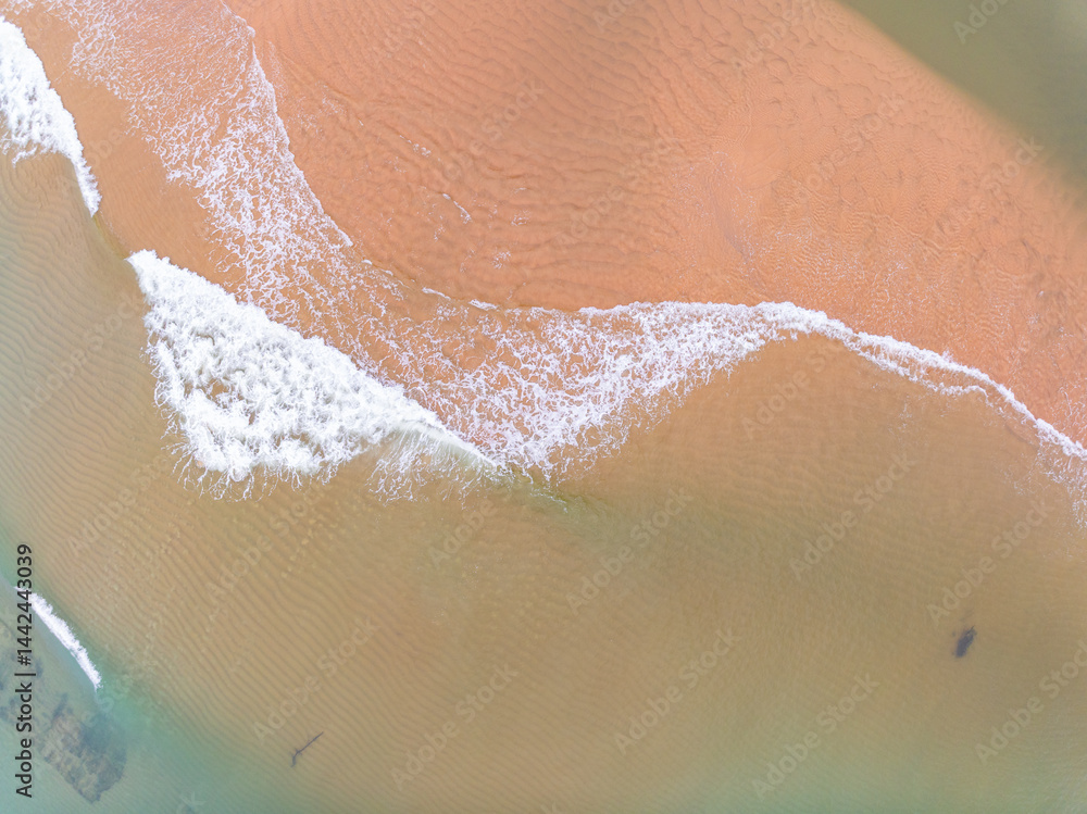 Fototapeta premium Aerial view of sandbar with sea water surface seascape background,Pink sand beach, Amazing summer background and holiday concept