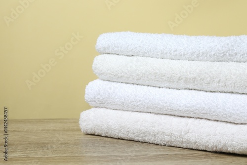 Stack of bath towels on the table