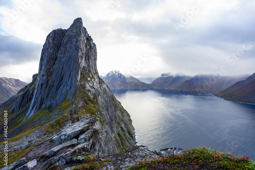 Stunning autumn landscape of Segla Mountain in Senja Island, Northern Norway, with dramatic cliffs and fjords.