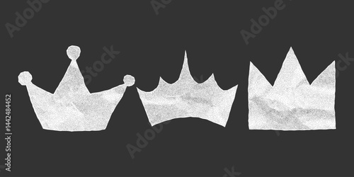Set of crumpled paper crown silhouettes on dark background. Jagged torn edges from notebook sheet with gritty dotted texture, royalty elements.